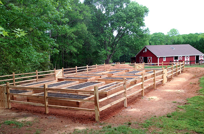 cedar raised beds at the GardenFarm are an example of raised bed gardening